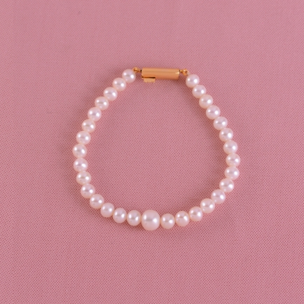 Creamish Pearls Bracelet stringed