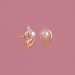 Shankh Motif Pearl Stud Earrings with Gold Polish