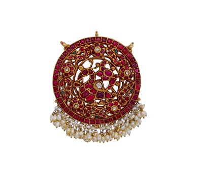 Gold peacok pendant with ruby polki and pearls