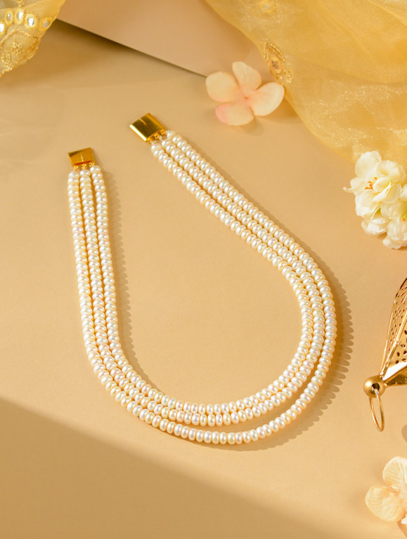 Buy Gold Pearl Bangles Set at Krishna Pearls